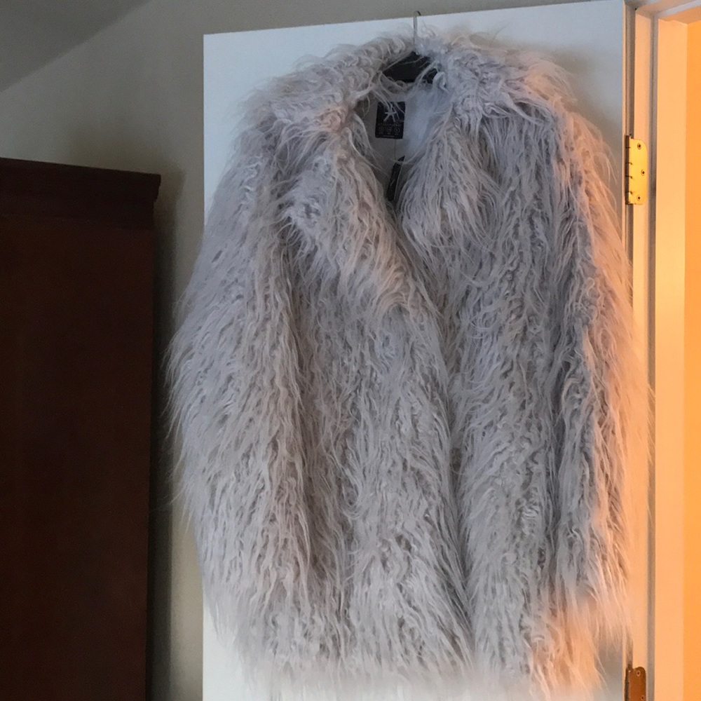 Faux fur. New with tags. Gray.